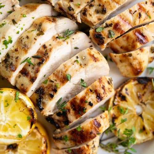 Grilled chicken coated with allergy friendly Greek marinade and served with lemon slices