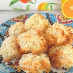 vegan orange coconut macaroons on blue patterned plate