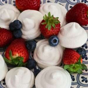 vegan egg free meringues with strawberries and blueberries